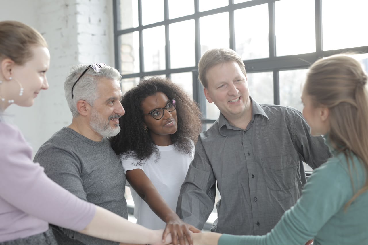 Two people shaking hands after a successful hire