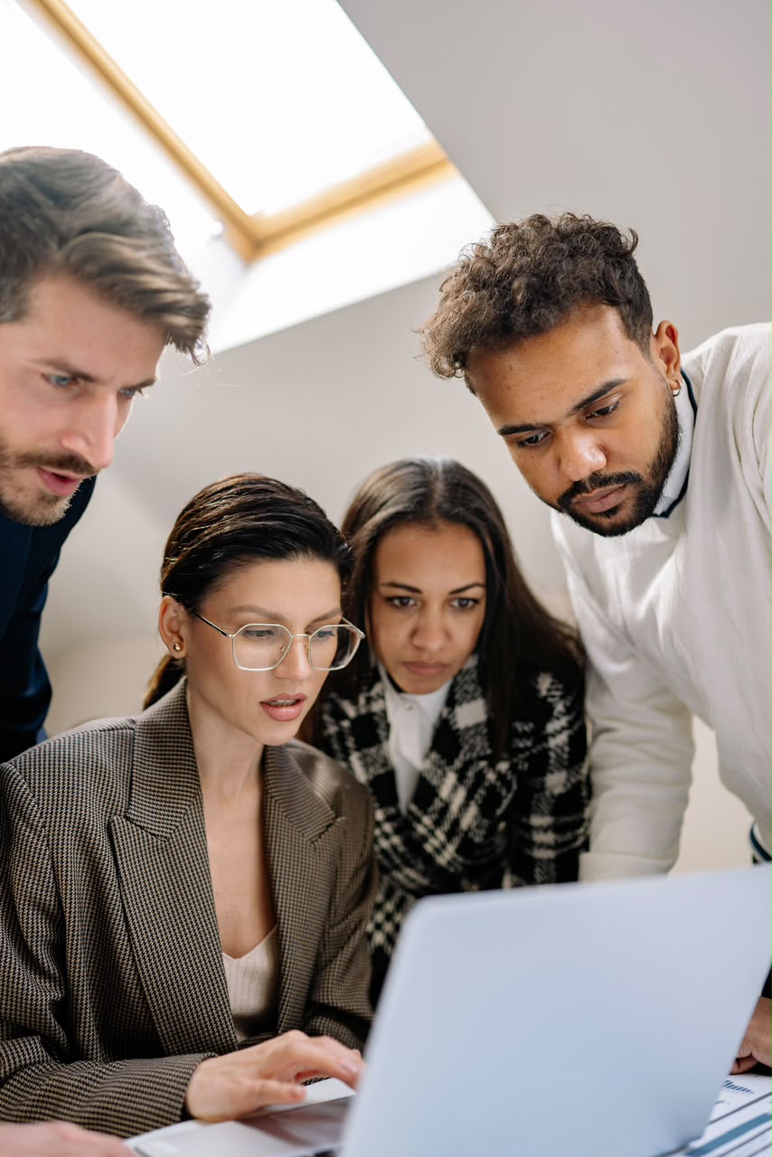 Team members planning together at a table